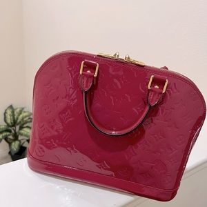 Monogram Vernis Alma PM Hand Bag
